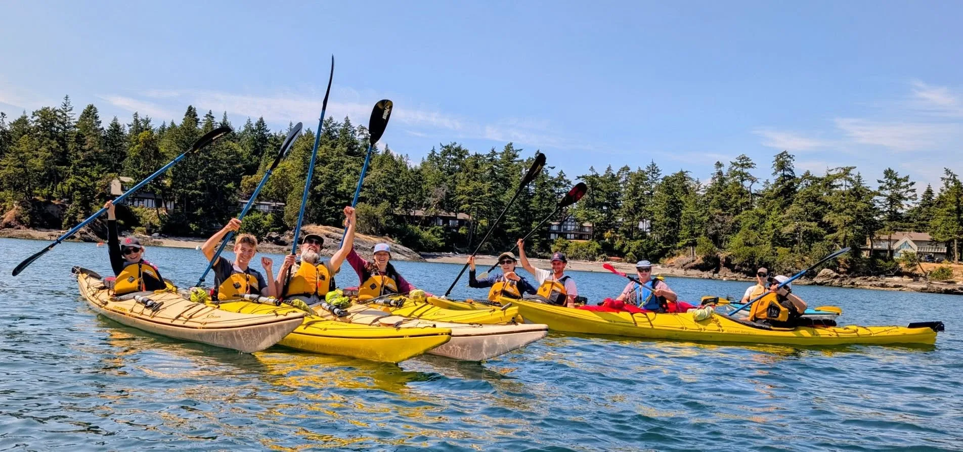 group of happy kayakers