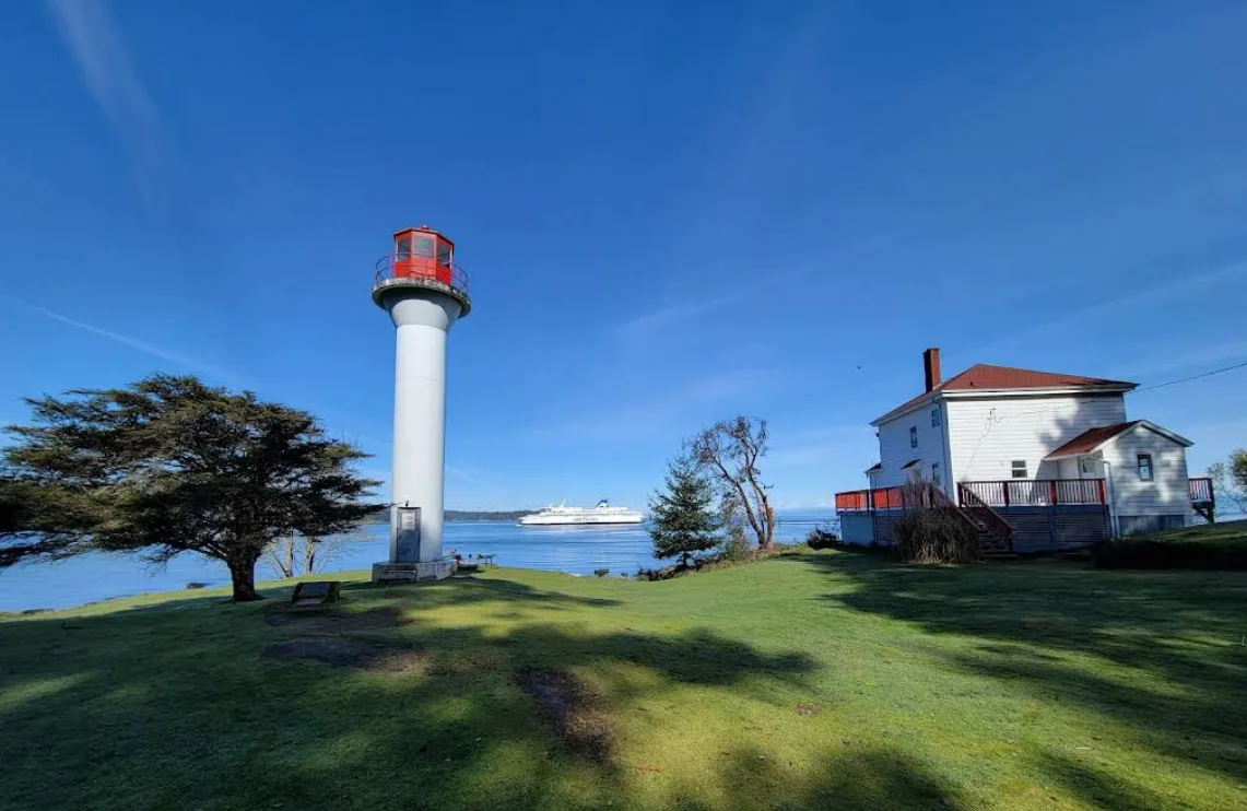 Active Pass Lighthouse with BC Ferries in the background